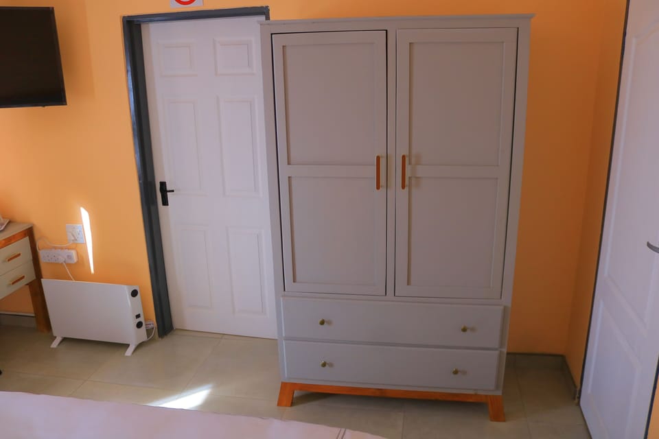 Double or Twin Room, City View | Desk, laptop workspace, iron/ironing board (on request), WiFi (free)