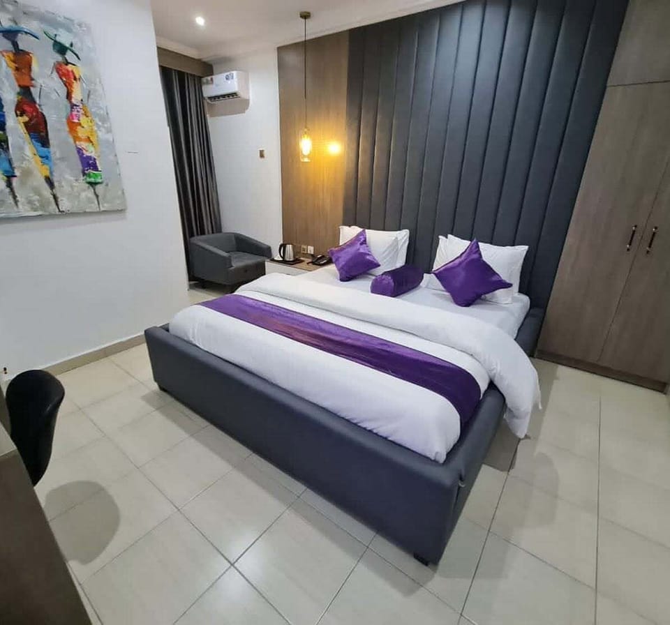 Family Room, Balcony, City View | Desk, laptop workspace, blackout drapes, soundproofing