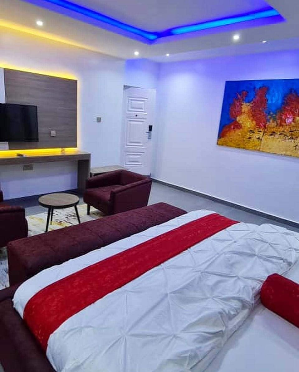 Family Room, Balcony, City View | Desk, laptop workspace, blackout drapes, soundproofing