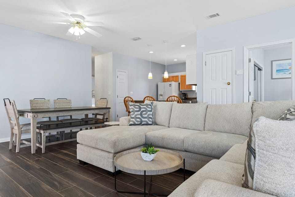 Living Room open to Dining and Kitchen