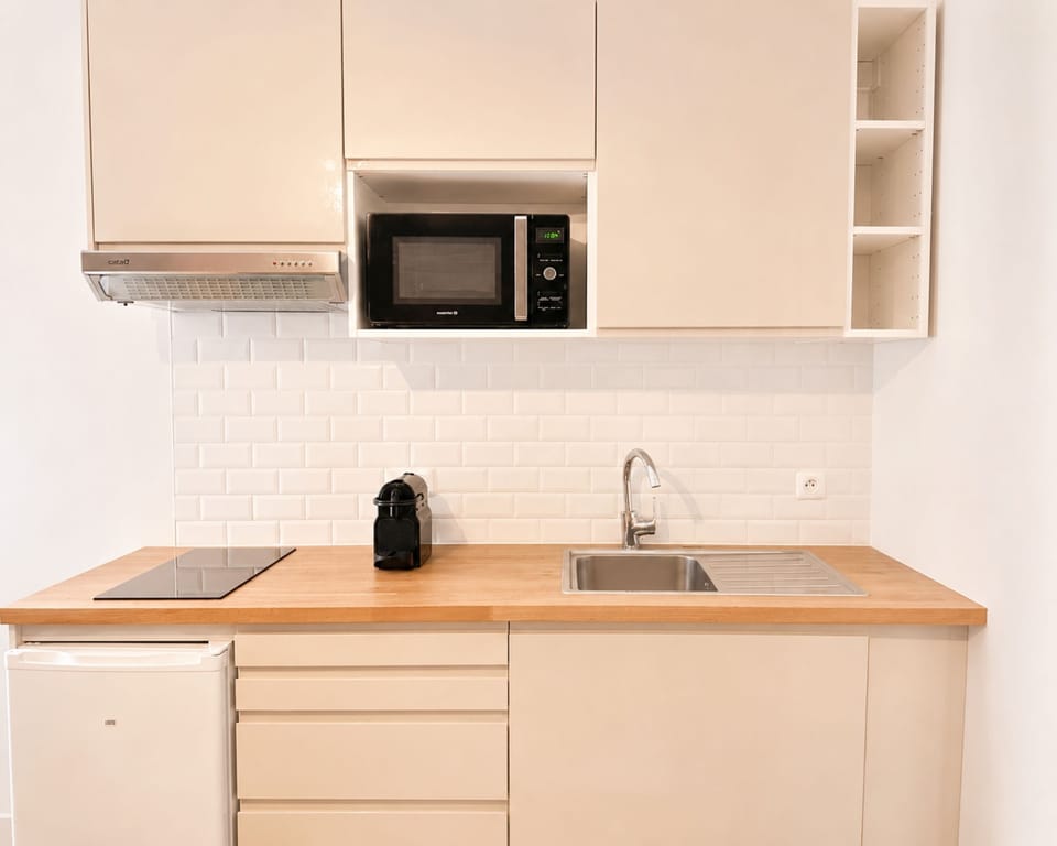 Standard Apartment, Courtyard View | Private kitchen | Espresso maker, electric kettle, toaster, freezer