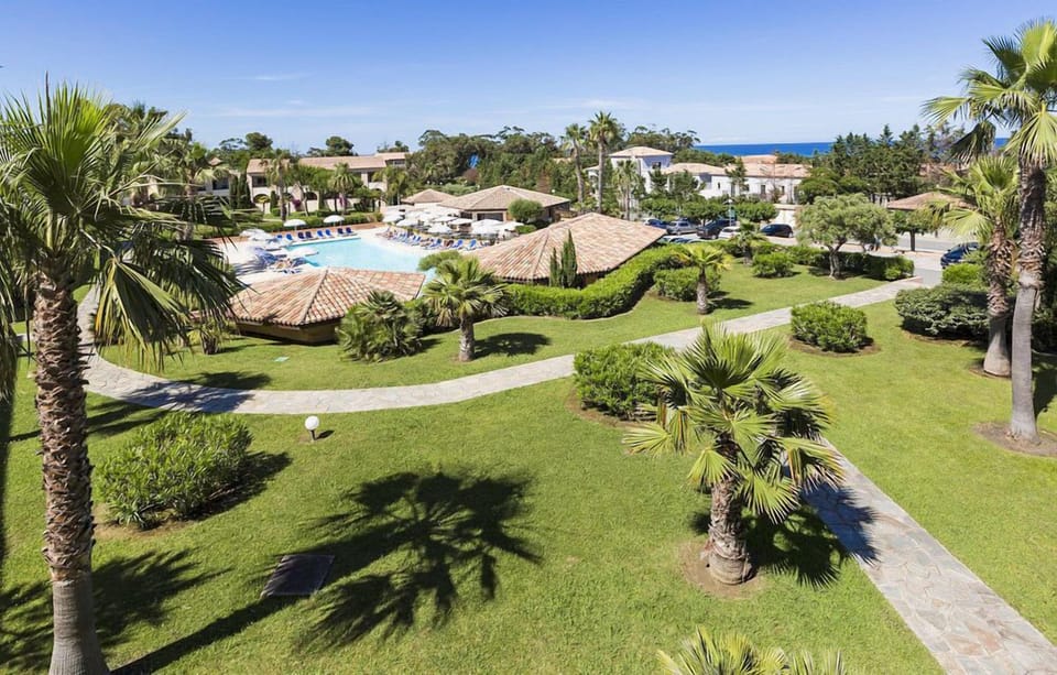 Wake up to views of vibrant gardens and the Corsican coastline from your private balcony or terrace.