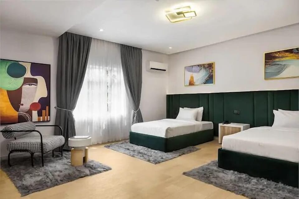 Economy Room, Balcony, City View | Desk, laptop workspace, blackout drapes, soundproofing