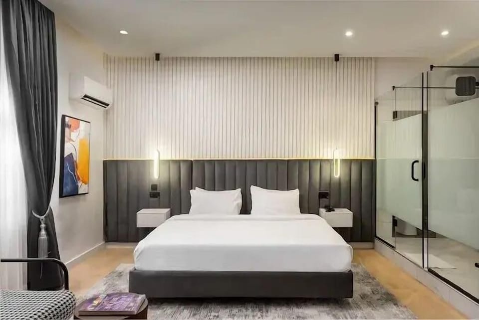 Family Room, Balcony, City View | Desk, laptop workspace, blackout drapes, soundproofing