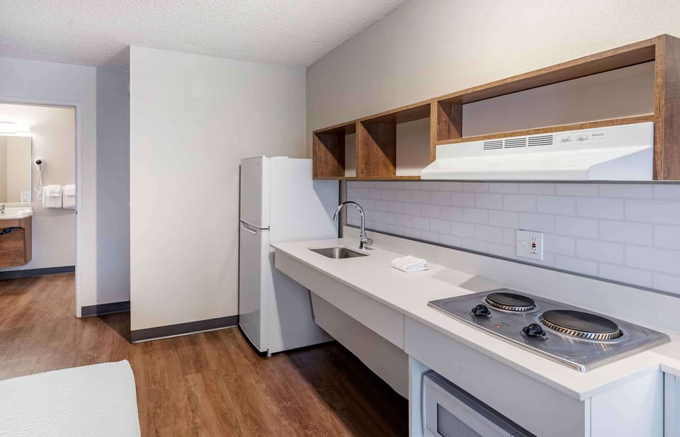 Fridge, microwave, stovetop, coffee/tea maker
