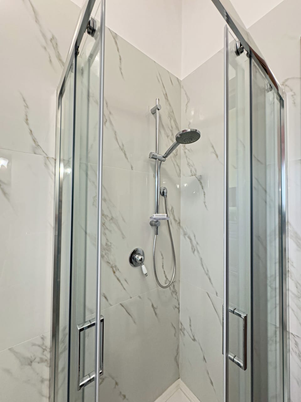 Double Room, Hill View | Bathroom | Shower, hair dryer, towels, soap