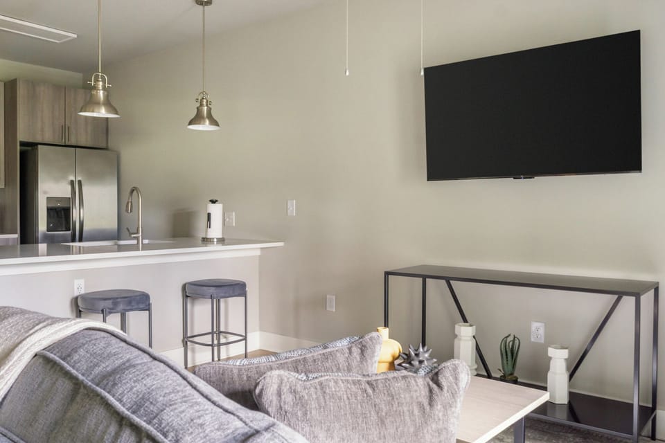Apartment, 1 Bedroom | Living area | 50-inch Smart TV with digital channels