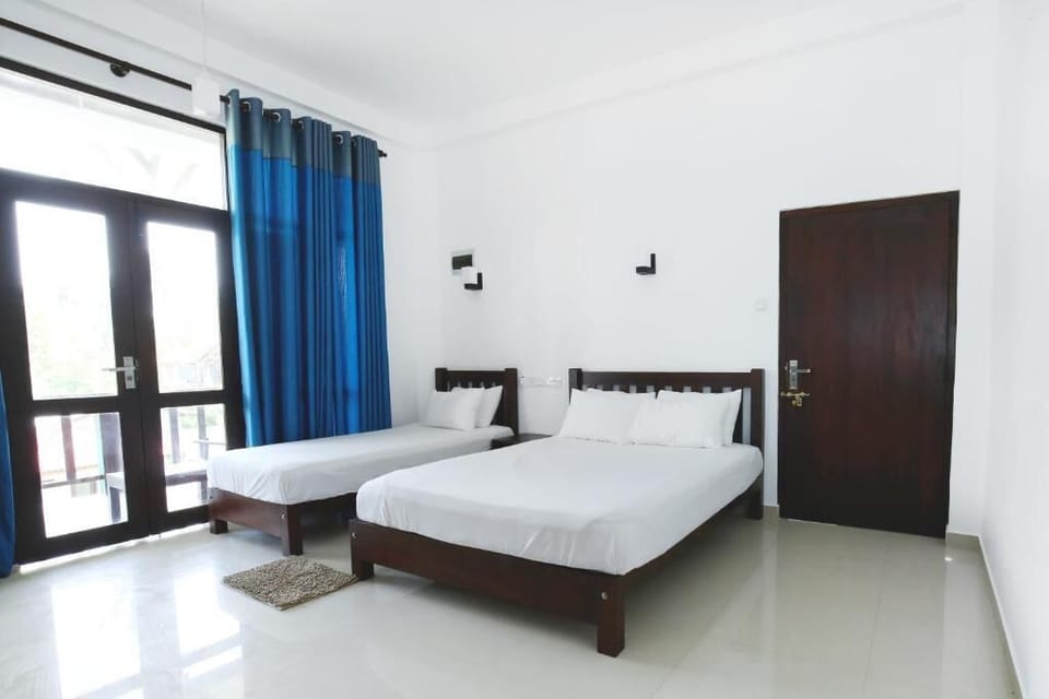 Deluxe Triple Room, Balcony, Pool View | Desk, free WiFi