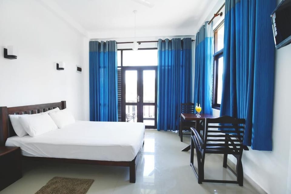 Deluxe Double Room, Balcony, Partial Ocean View | Desk, free WiFi