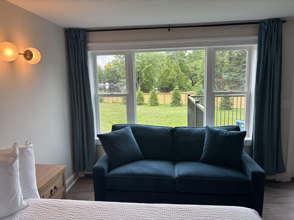 Comfortable pull-out sofa easily converts into a full-size bed.