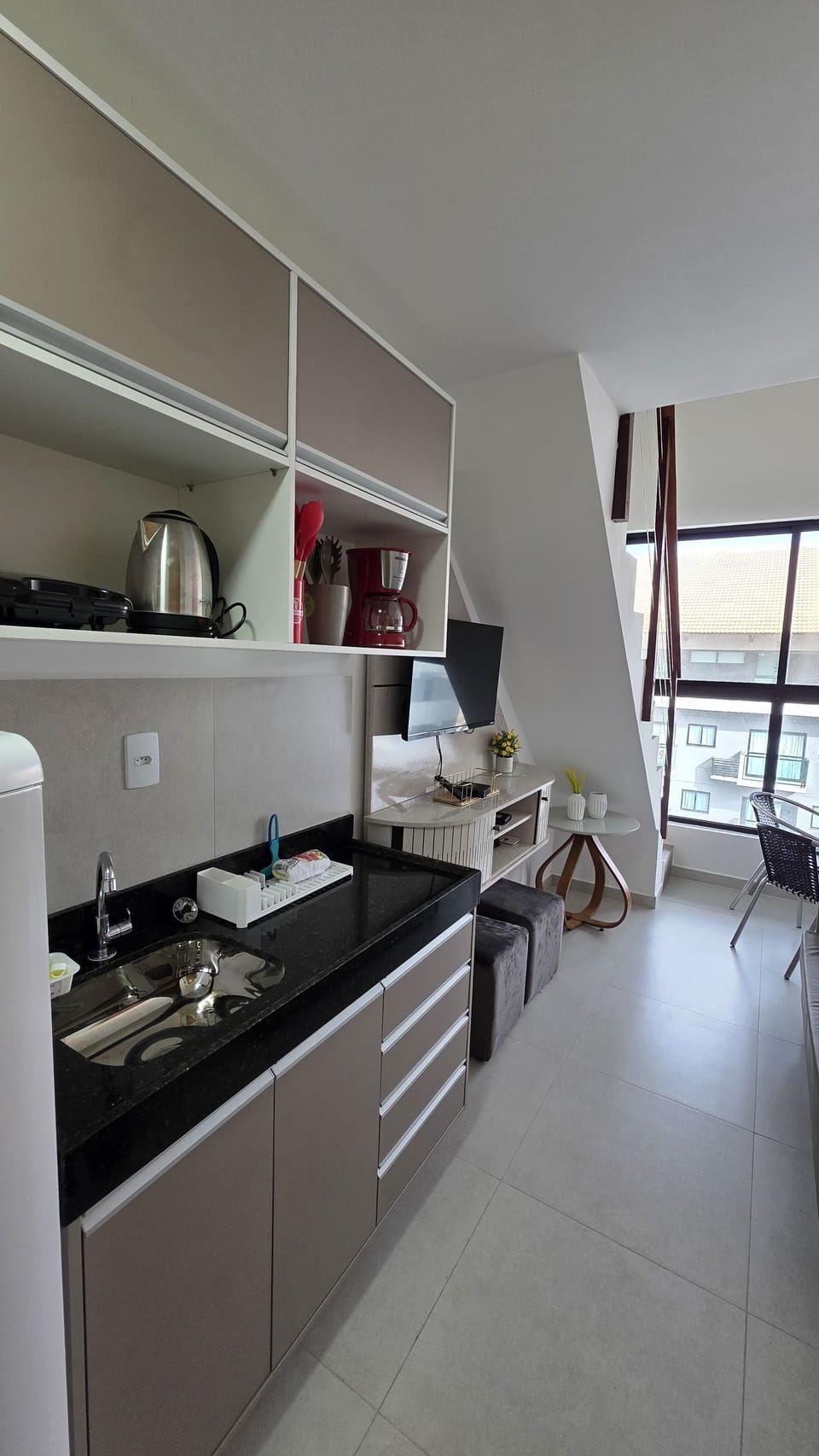Comfort Duplex, Courtyard View | Private kitchen | Fridge, stovetop