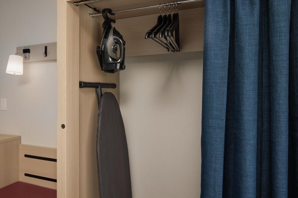 Desk, laptop workspace, blackout drapes, soundproofing