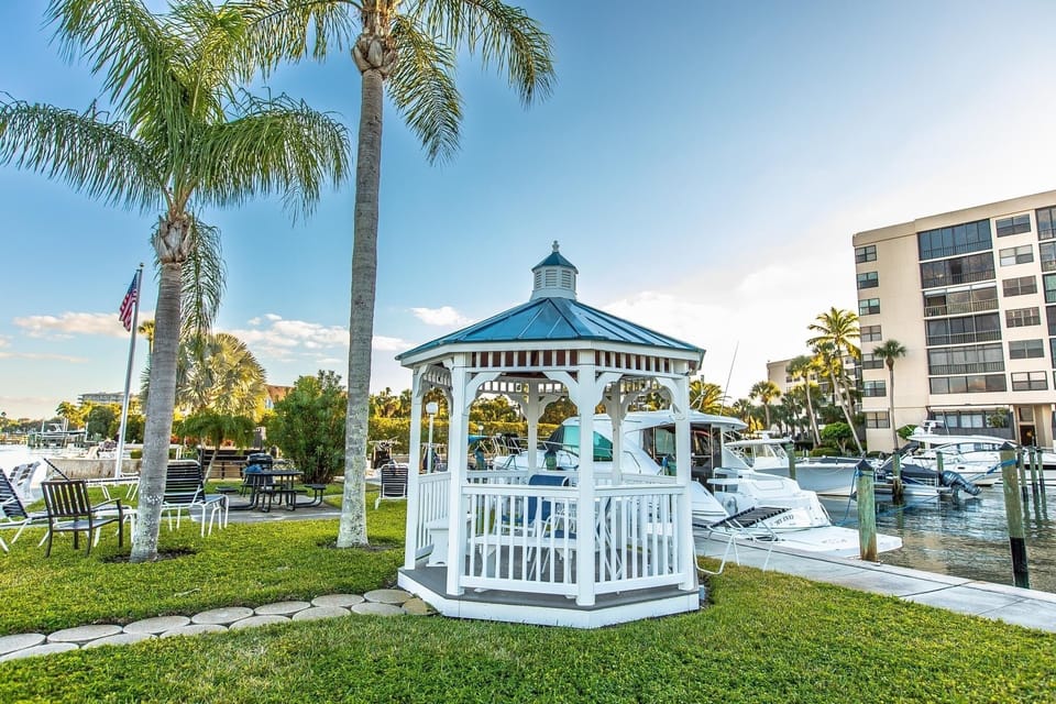 Charming white gazebo – a serene spot for morning coffee or evening chats.