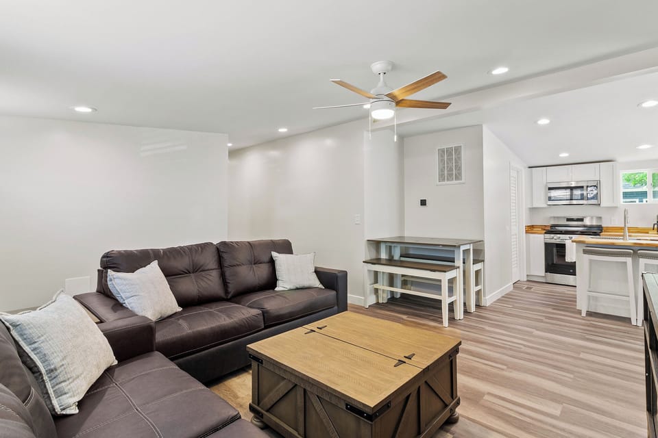 The Waterbury Way - Living Room with dining table