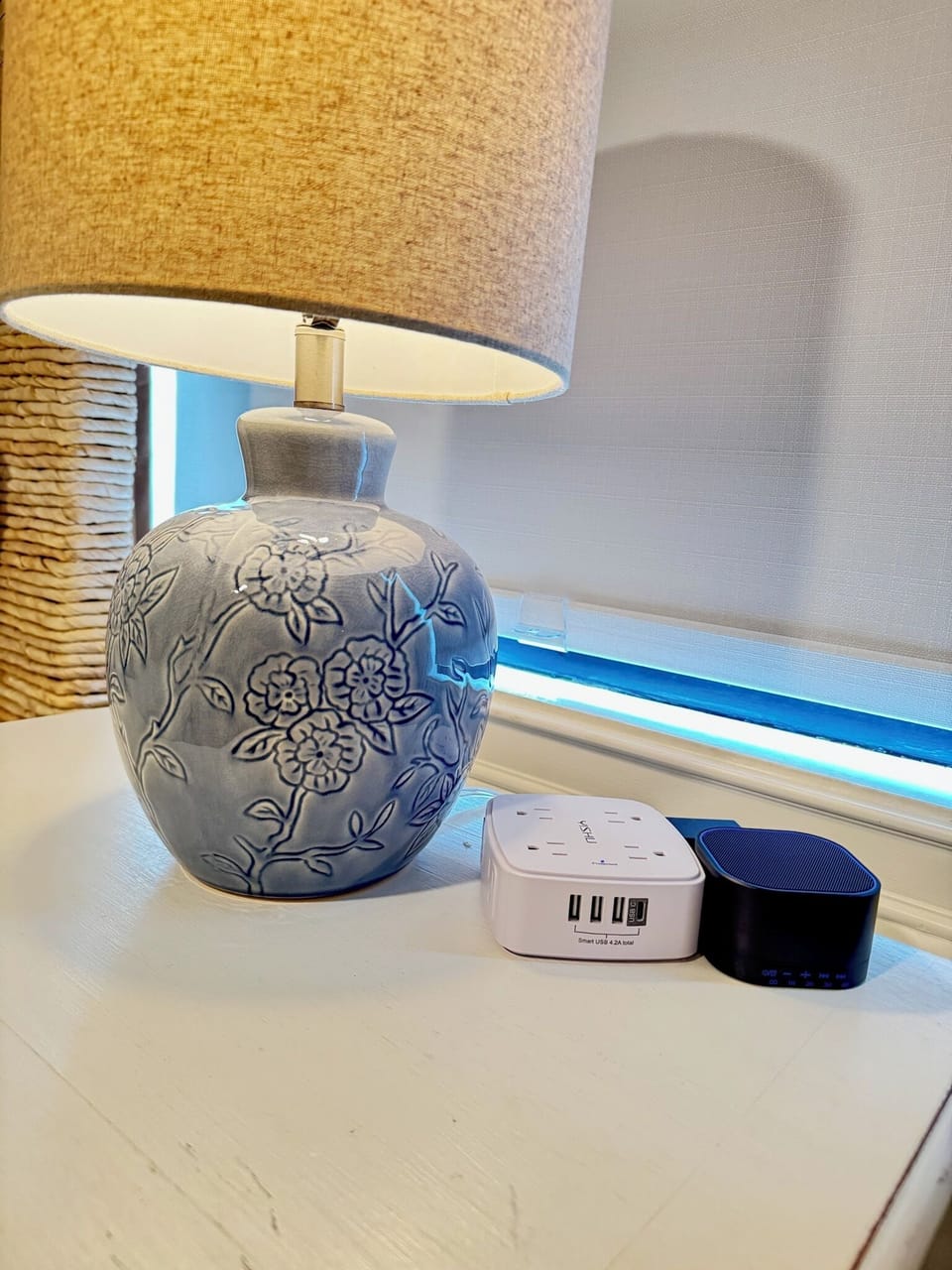 Convenient bedside charging station and sound machine for your stay.
