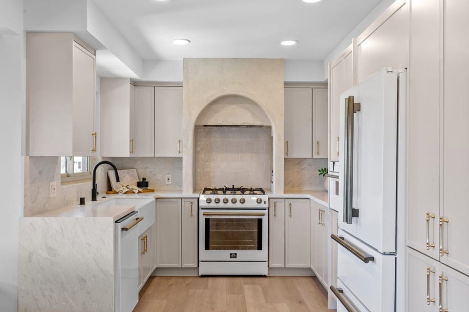 Cook like a pro in a fully stocked gourmet kitchen with luxe appliances