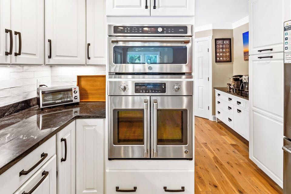 Whip up gourmet meals in the sleek Kitchen with stainless-steel appliances and a 6-burner gas stove.