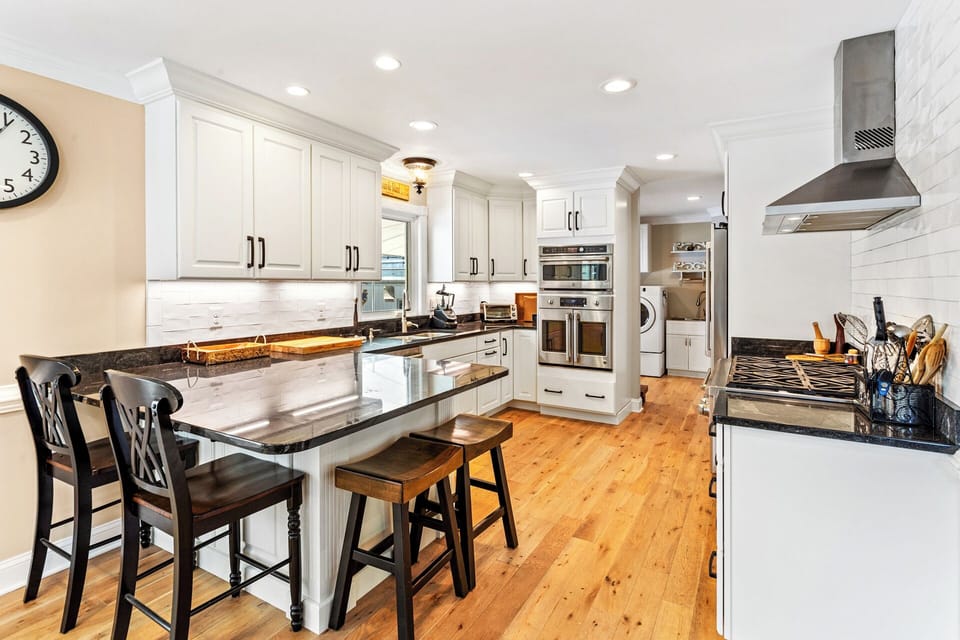 Whip up gourmet meals in the sleek Kitchen with stainless-steel appliances and a 6-burner gas stove.
