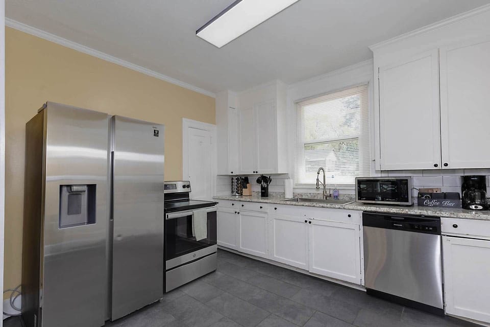 Kitchen with Stainless Steel Appliances and Quartz Counters