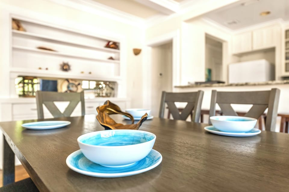Modern dining area with seating for 6, perfect for family meals, game nights, remote work, or gatherings. Enjoy a comfortable and stylish space designed for dining, entertaining, and making memorable moments during your stay