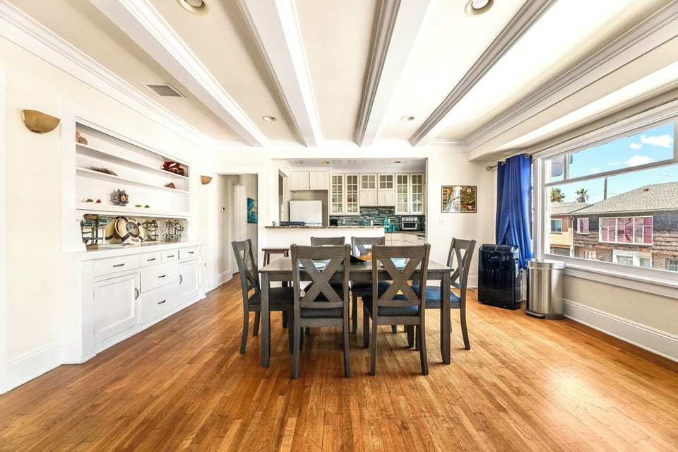 Modern dining area with seating for 6, perfect for family meals, game nights, remote work, or gatherings. Enjoy a comfortable and stylish space designed for dining, entertaining, and making memorable moments during your stay