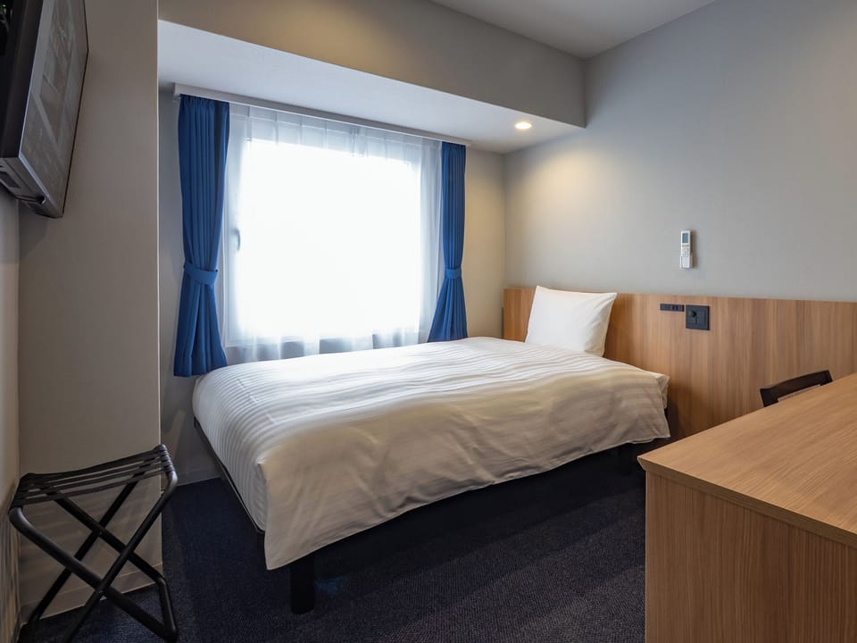 Economy Single Room, Smoking | Laptop workspace, blackout drapes, iron/ironing board, free WiFi