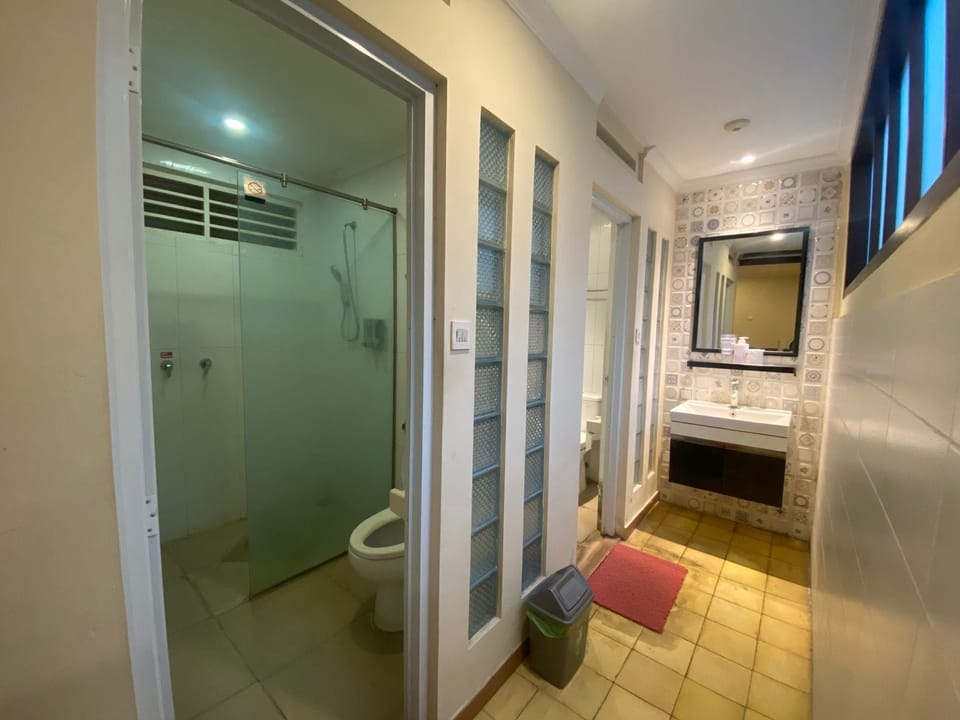NAKULA SADEWA 2 BED ROOM | Bathroom | Shower, hair dryer, bidet, towels