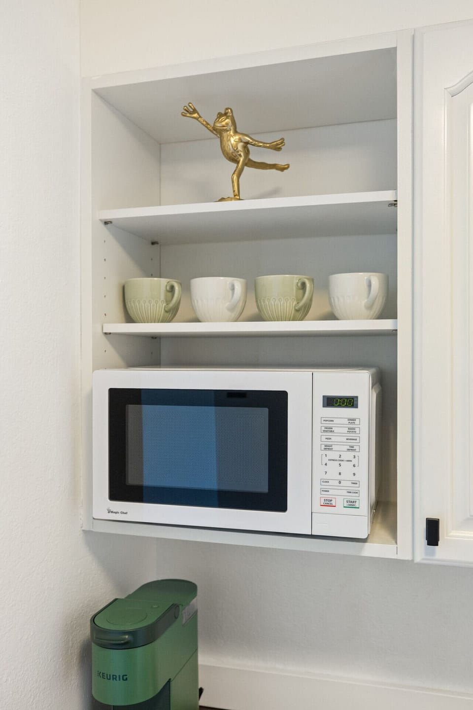 Microwave station with mugs thoughtfully provided for your convenience.