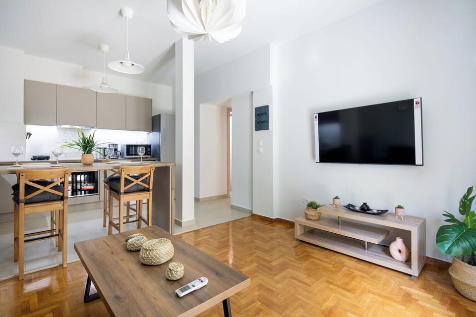 Apartment, 1 Bedroom, Kitchen, City View | Living room | 53-inch Smart TV with digital channels, streaming services