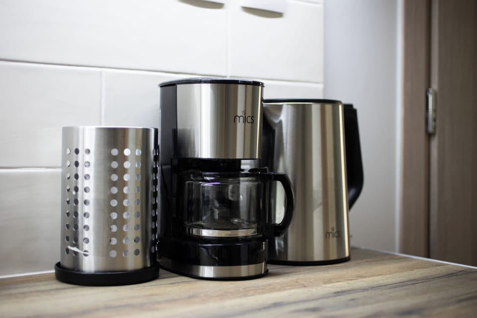 Apartment, 1 Bedroom, Kitchen, City View | Coffee and/or coffee maker