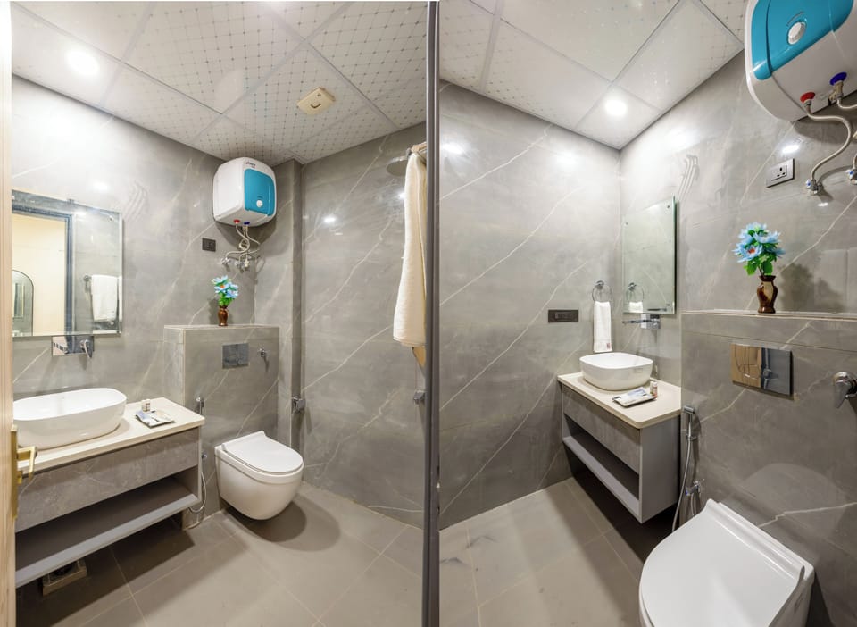 Family Room | Bathroom | Shower, hair dryer, slippers, towels