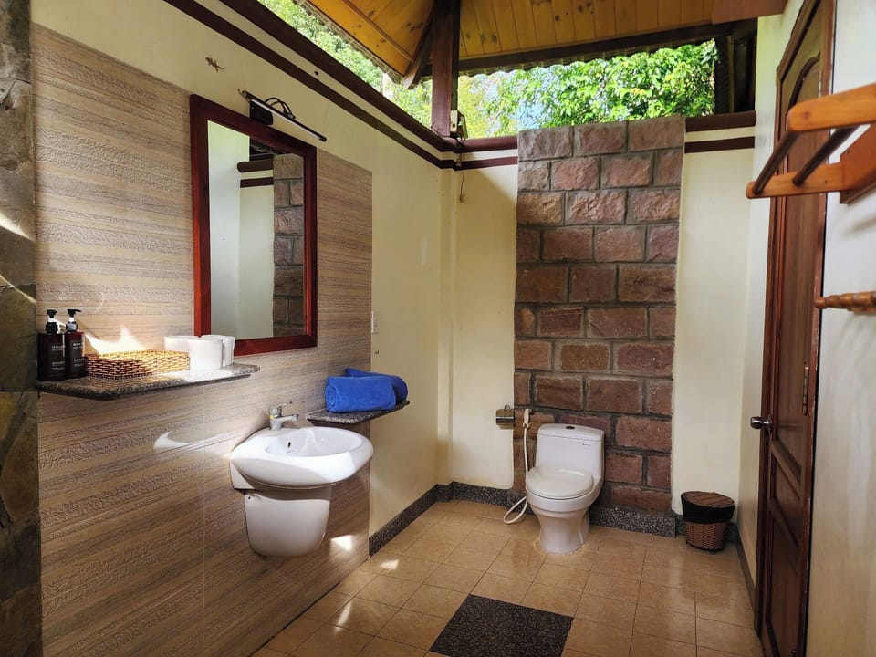 Standard Studio, Balcony, Resort View | Bathroom | Shower, rainfall showerhead, free toiletries, hair dryer