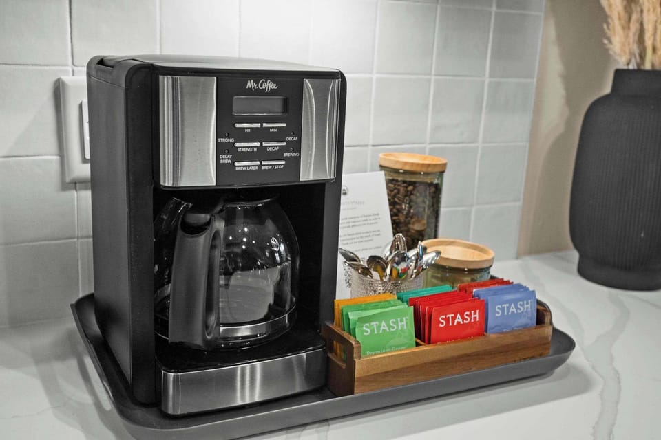 Drip coffee maker, and starter pack of fresh local beans from Humphrey's Coffee, coffee grinder, filters, and tea! 