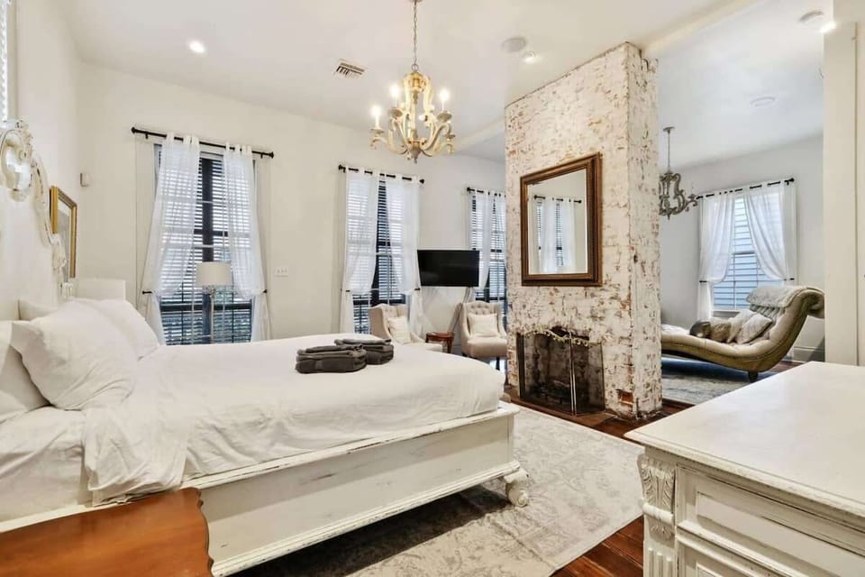 Bedroom 1 with King Mattress, Fireplace Accent, Smart TV and Sitting Area