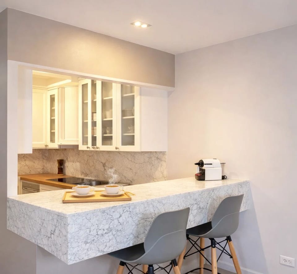 Deluxe Apartment, Courtyard View | Private kitchen | Espresso maker, electric kettle