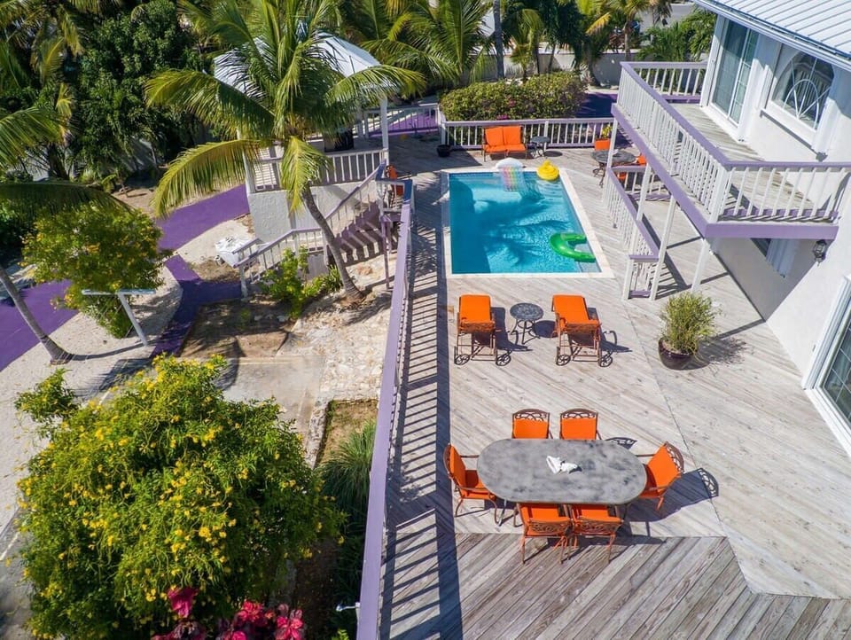 Relax by the pool and soak up the sun, just steps from the beach.