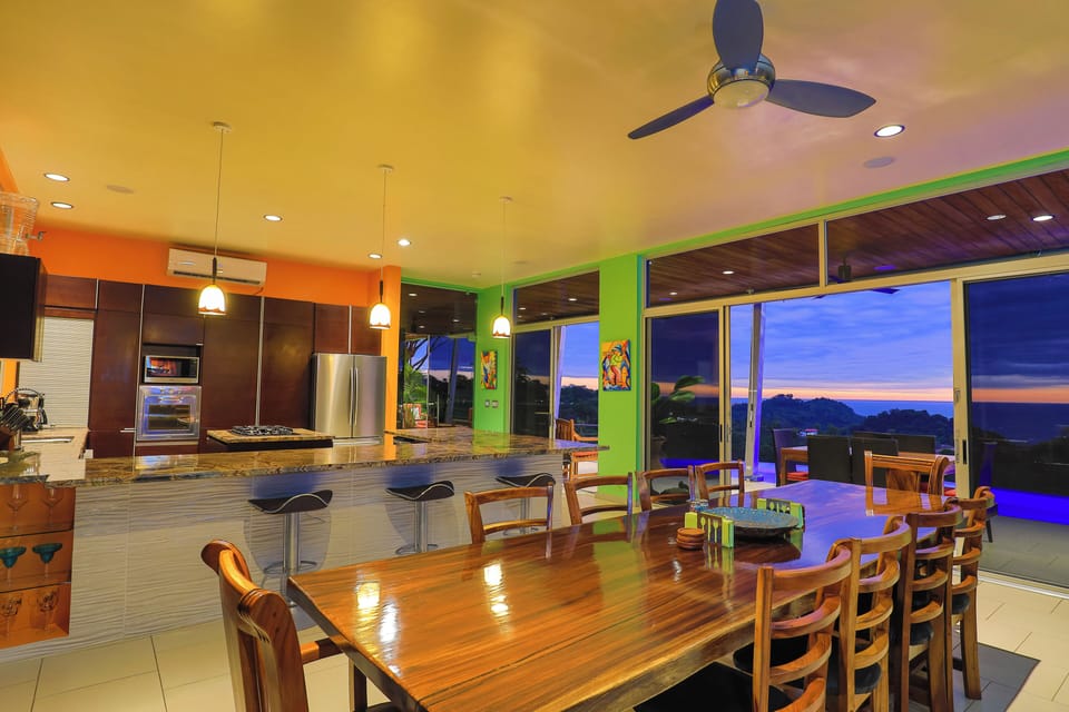 This massive 11' dining table comfortably seats 10. All rooms are air-conditioned or open-air living