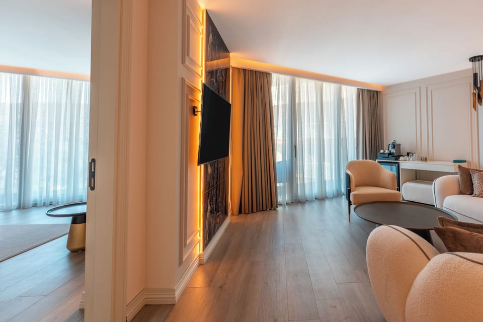Junior Suite, Balcony, Garden View | Premium bedding, minibar, in-room safe, desk