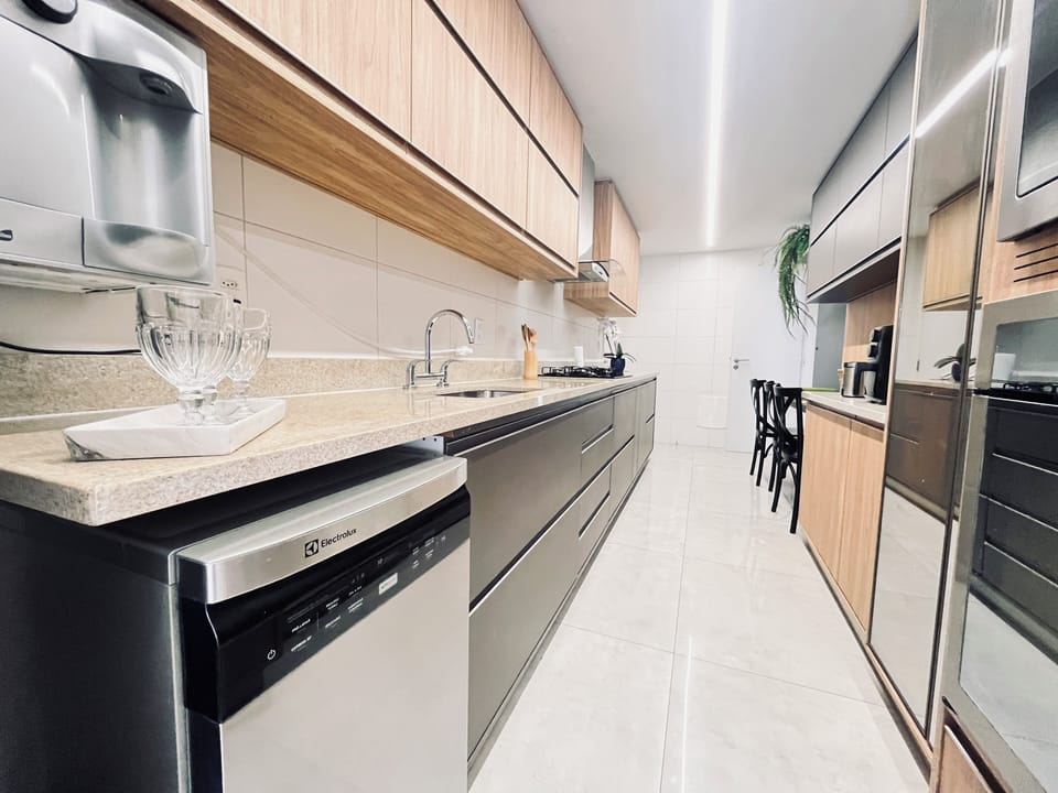 Deluxe Apartment | Private kitchen | Full-size fridge, microwave, oven, espresso maker