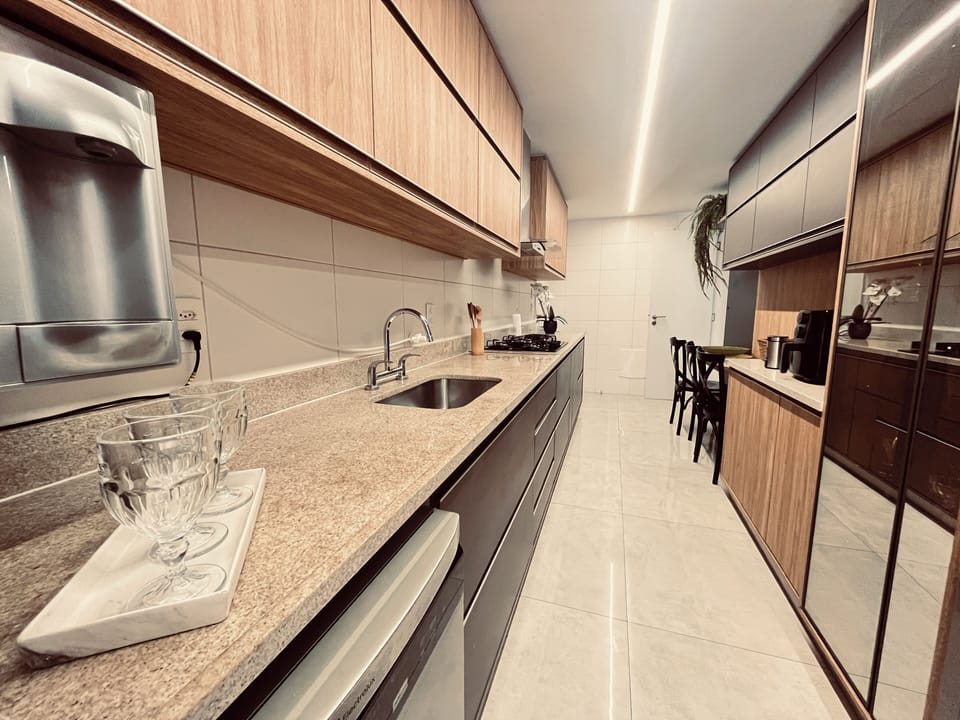 Deluxe Apartment | Private kitchen | Full-size fridge, microwave, oven, espresso maker