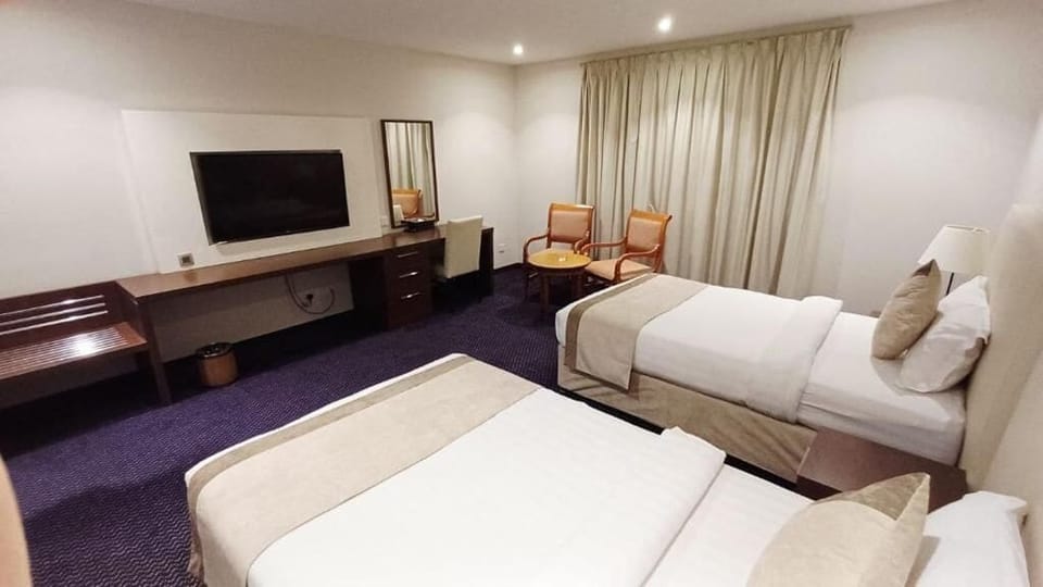 Iron/ironing board (on request), WiFi (free)