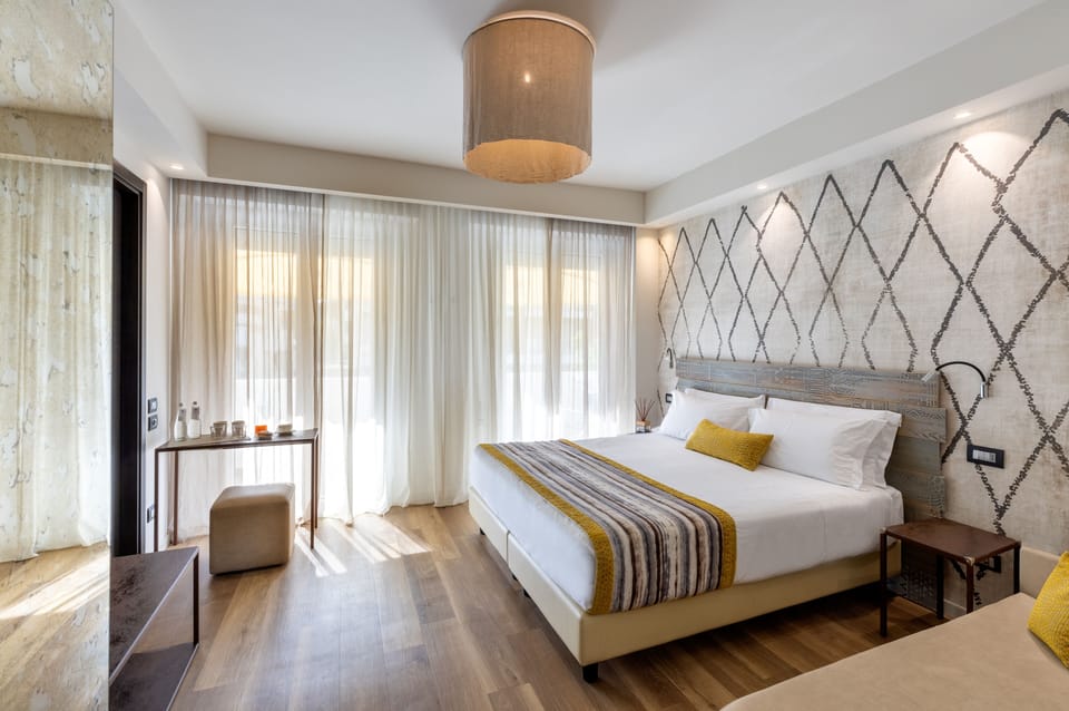 Superior Triple Room, 1 Double Bed with Sofa bed | Minibar, in-room safe, desk, WiFi (free)