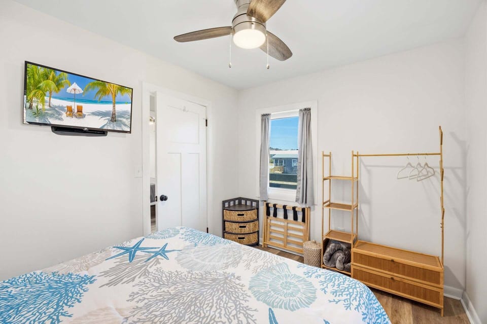 Relax in the BONUS Queen Bedroom.