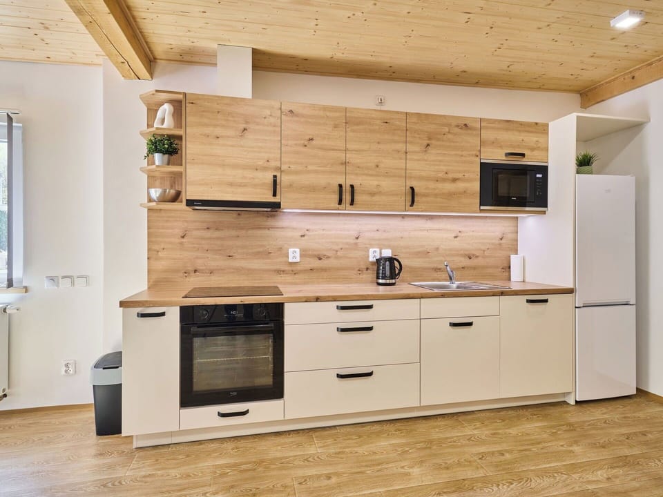Kitchen, Flooring, Countertop, Furniture, Cabinetry, Wood, Interior Design, Floor, Kitchen Appliance, Wood Flooring