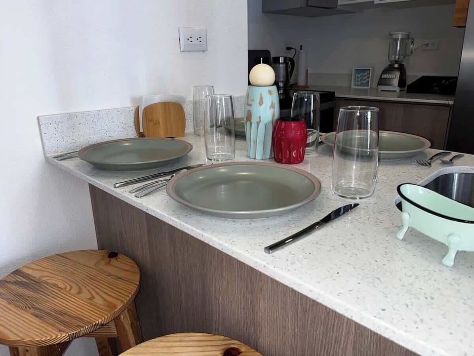 Dining space is limited as this is a cozy apartment, but we've carefully arranged it to maintain a spacious and comfortable feel.