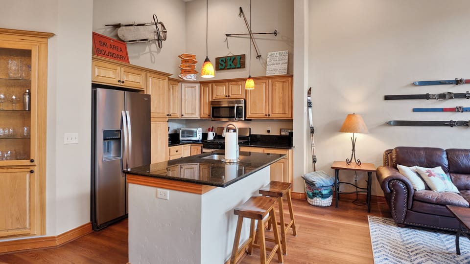 Open kitchen with bar seating