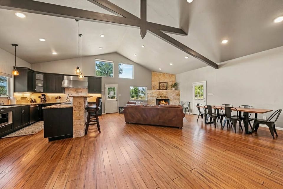 Enjoy the heart of the home with a bright, open layout where the kitchen, dining, and living areas flow effortlessly—perfect for entertaining, connecting, and relaxing as a group.