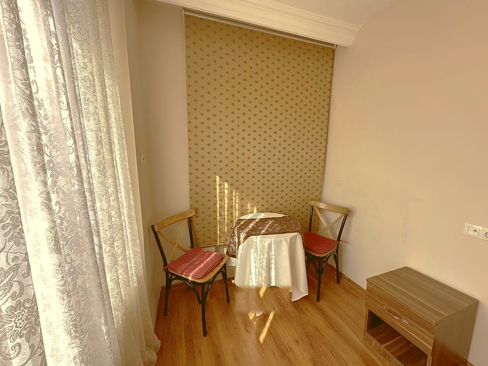 Comfort Twin Room, 2 Bedrooms, Accessible Bathtub | Living area | 15-cm LCD TV with satellite channels