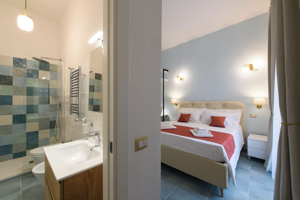 Superior Triple Room, City View | In-room safe, desk, laptop workspace, blackout drapes