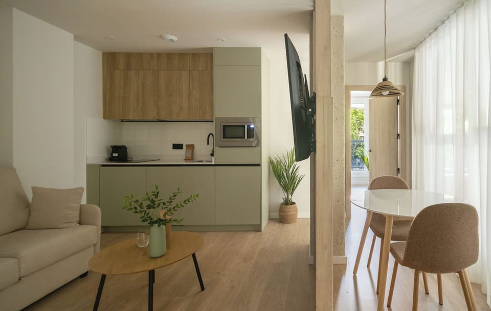 Standard Apartment, 1 Bedroom, Terrace | Living area | 50-inch TV with cable channels
